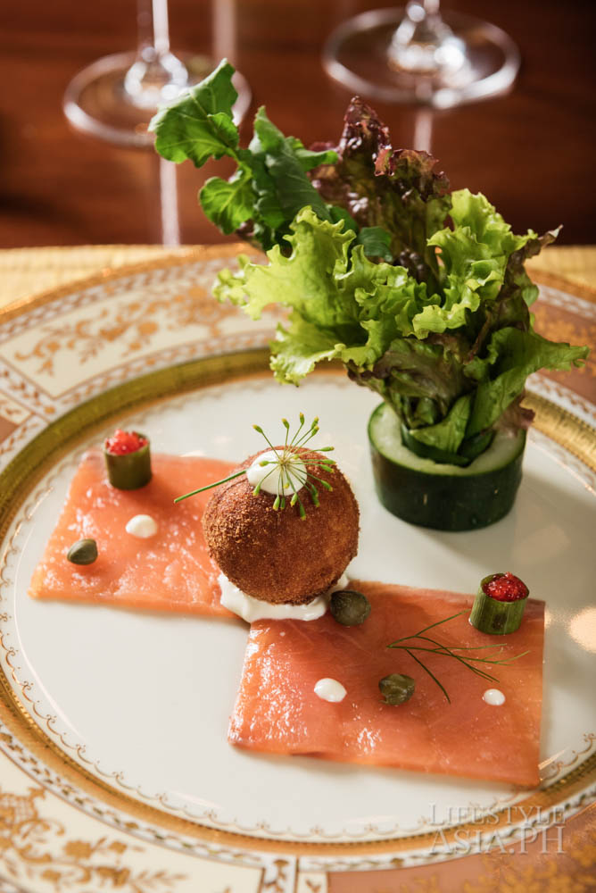 An eight-course dinner prepared by Chef Inann Soriano of the Tower Club includes a carpaccio salmon dish
