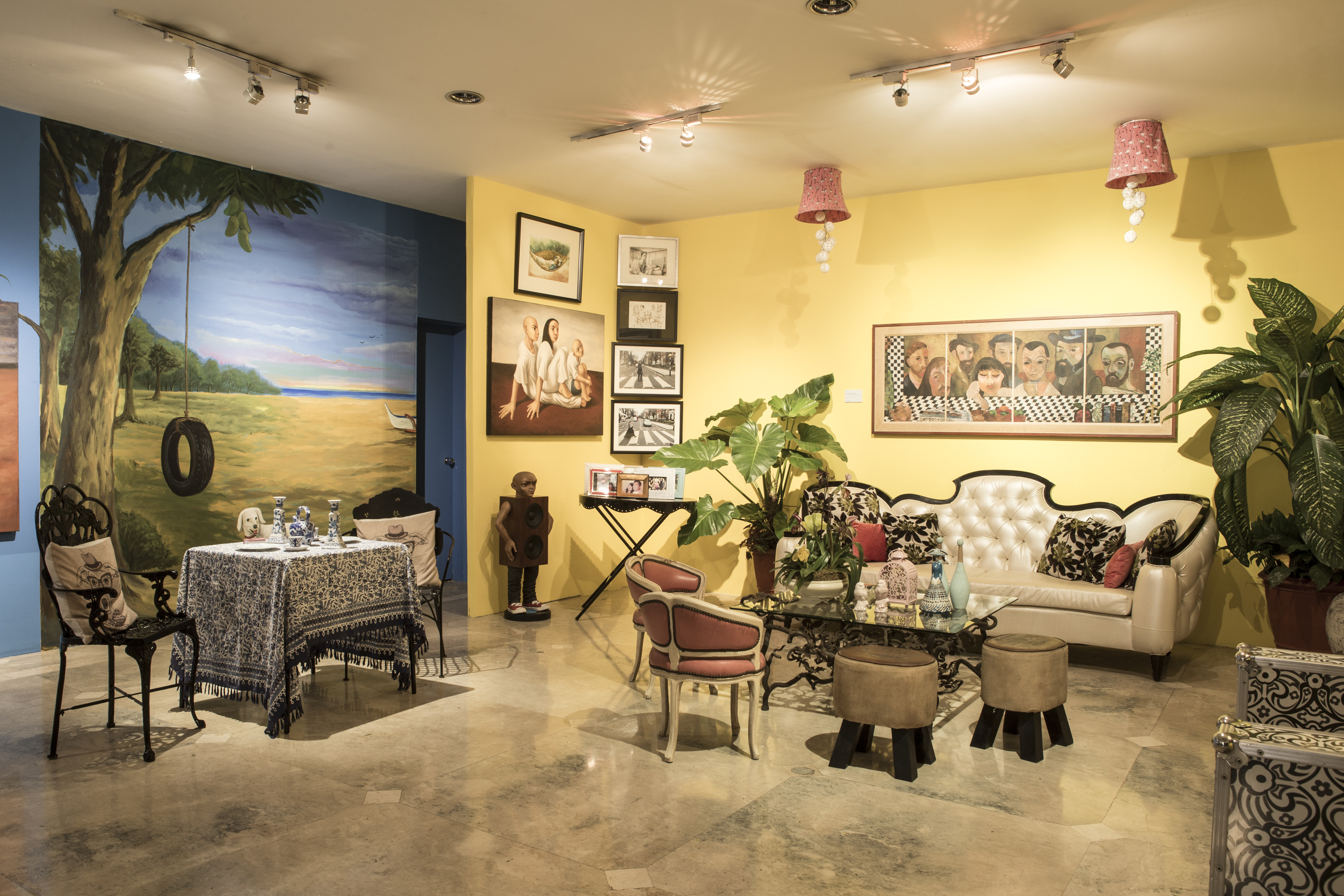 The living room of Elmer Borlongan and Plet Bolipata is recreated by the main entrance of the museum using furniture and decor from their residence
