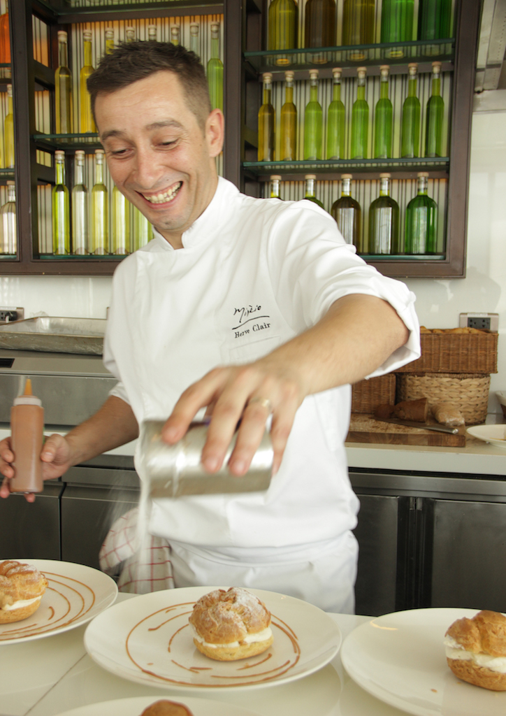 Chef Hervé preparing the cream puff dessert