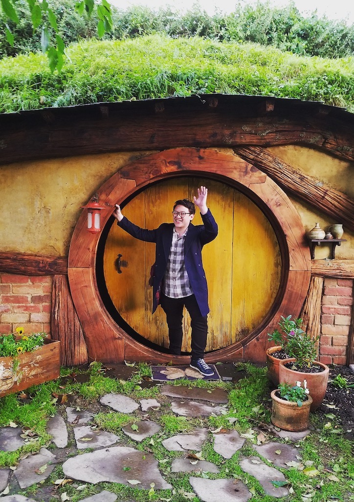 Your author at the Hobbiton movie set. Hobbit Holes of different sizes were built to accomodate every shot needed in the movies