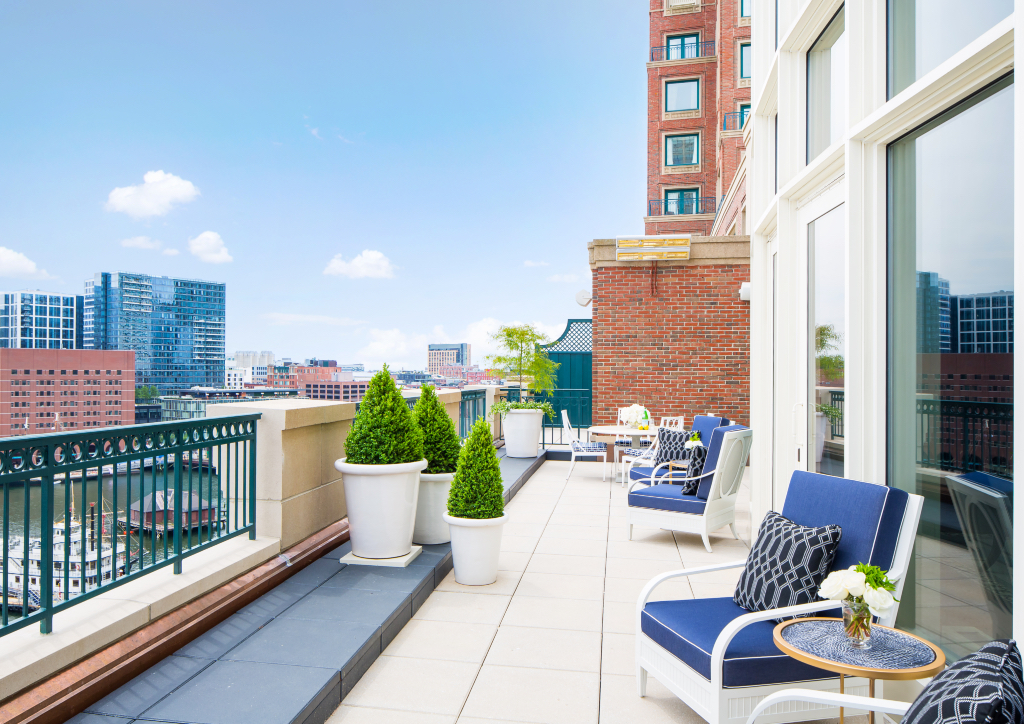 The suite also includes a 1,000 square foot open air-terrace that invites a panoramic view of the Boson Harbor (Photo courtesy of Boston Harbor Hotel)