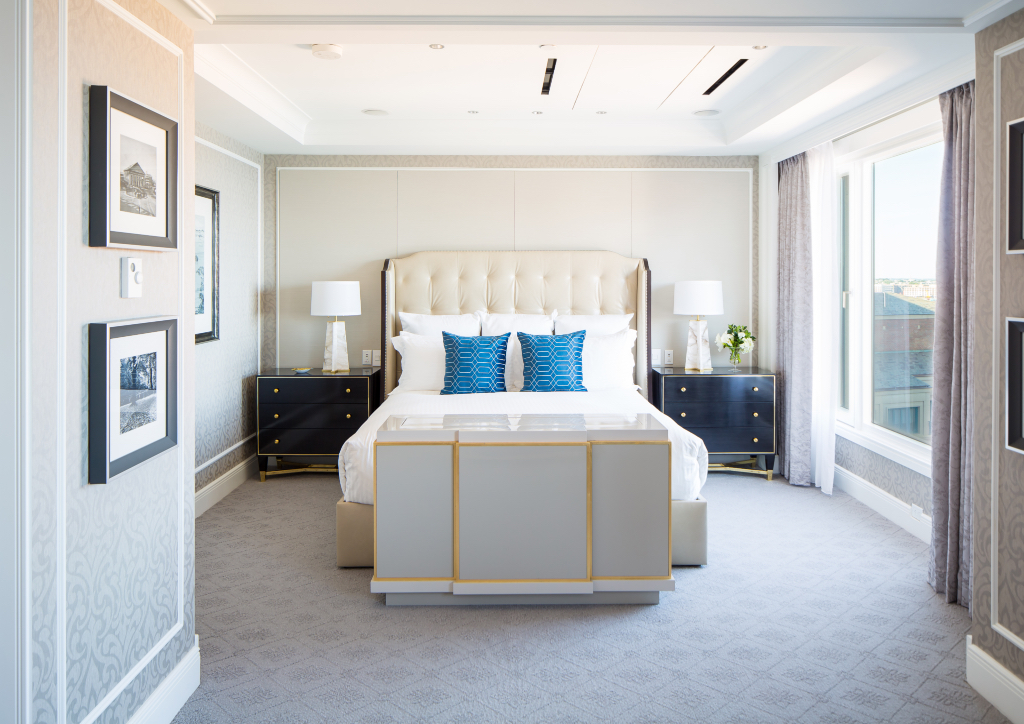 The master bedroom mirrors the interiors designed by Smith Firestone Associates, which showcases a fusion of classic and contemporary elements in neutral hues (Photo courtesy of Boston Harbor Hotel)