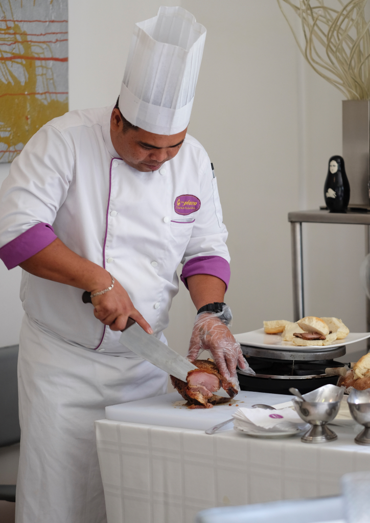 A chef carving meat during Rissa Mananquil Trillo's party