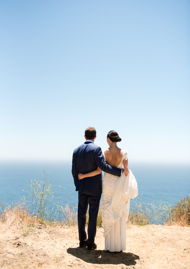 Newlyweds Corey Schwartz and Joy Chua enjoy the view of the California coast (Photograph by Viera Photographics)
