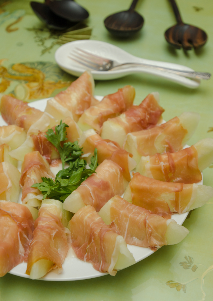 Melons wrapped in prosciutto (Photograph by Miguel Abesamis)