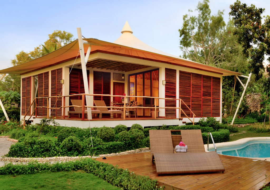The Pool Villa features a spacious balcony for lounging and a private pool for cooling off