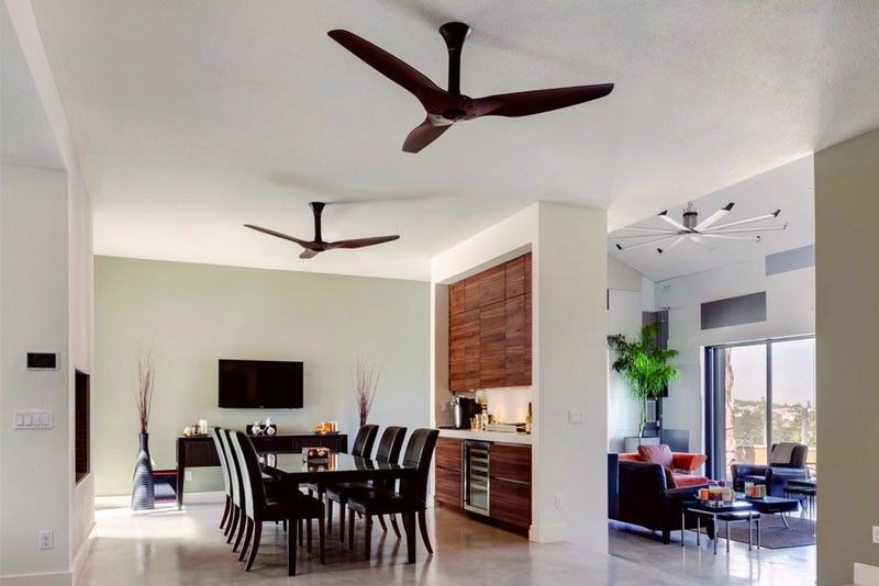 Wooden ceiling fans in a dining room.