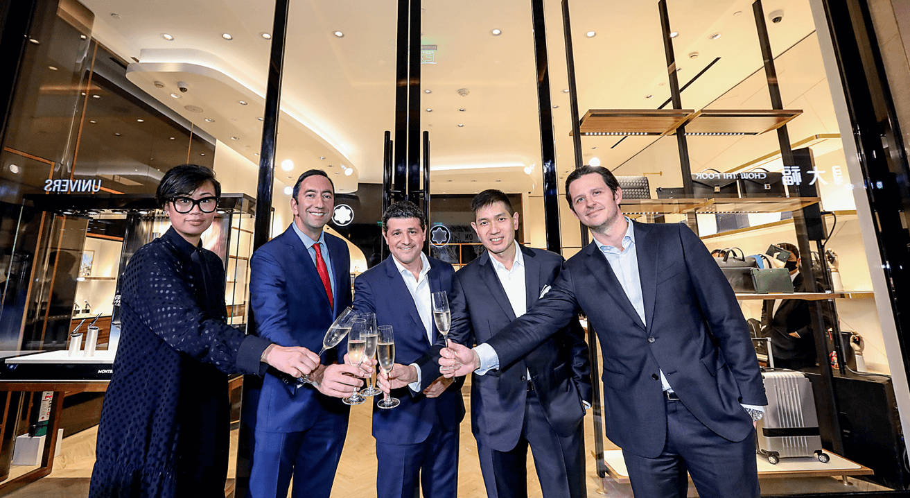 Rustan’s, Montblanc, and Solaire executives doing a toast to signify the opening of the Montblanc Solaire Boutique